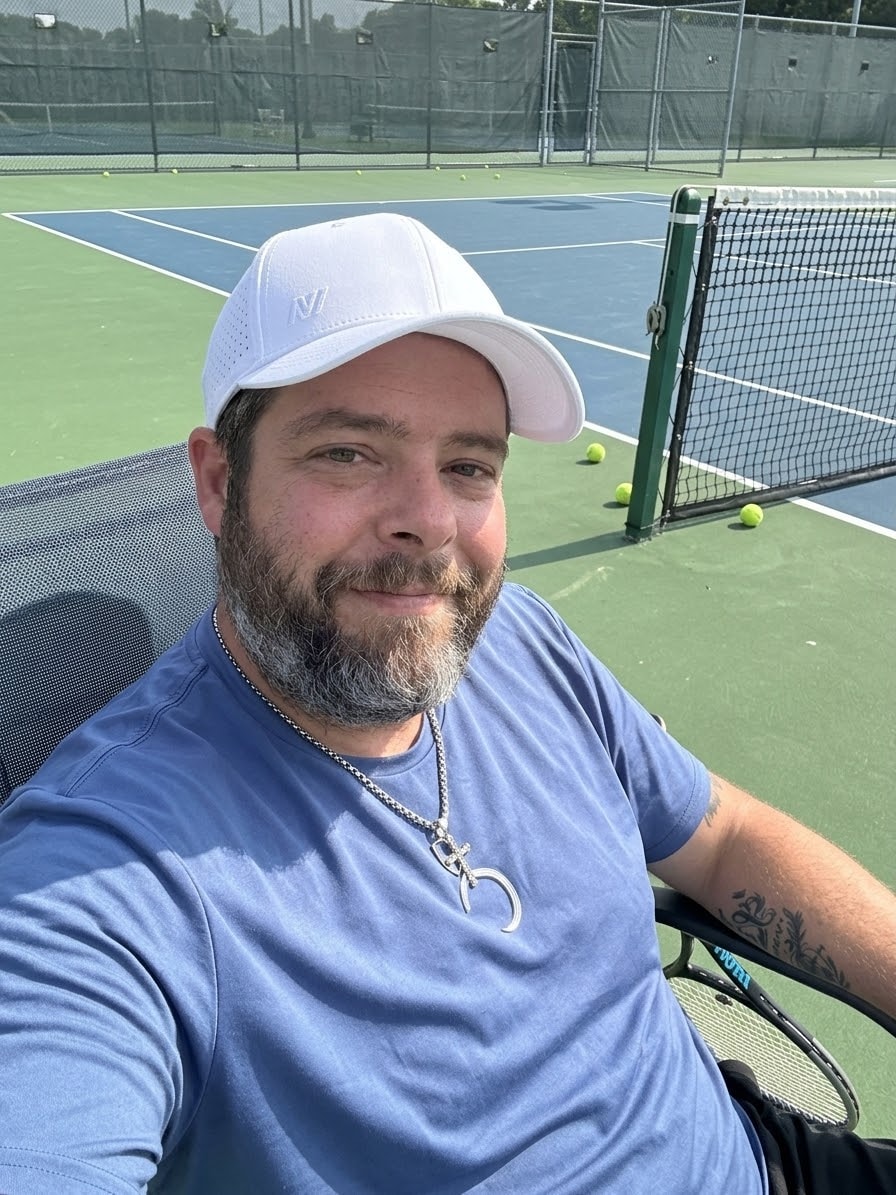 Coach Justin at the tennis court